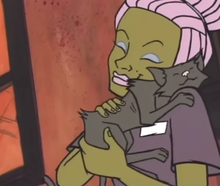 a pic of mecca from mtv downtown holding a black cat